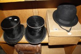 A G. A. Dunn & Co. black top hat, boxed, a Christy's London grey top hat, boxed, another black top