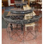 A Victorian three tier semi circular wirework planter. 130cm wide