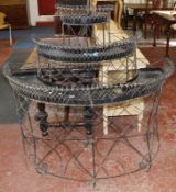 A Victorian three tier semi circular wirework planter. 130cm wide