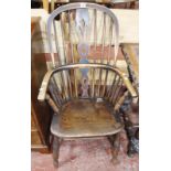 A hoop back windsor chair, a similar cut down chair and a cream upholstered arm chair. Best Bid