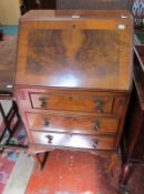 A 20th century Queen Anne style walnut bureau