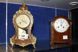 A Boulle style tortoiseshell and brass marquetry mantel clock, 29cm high and a mahogany cased mantel