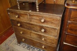 A 19th century mahogany chest of drawers 105cm wide x 52cm deep x 103cm high, a cane chair and a