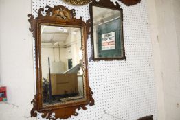 Two George II style walnut wall mirrors