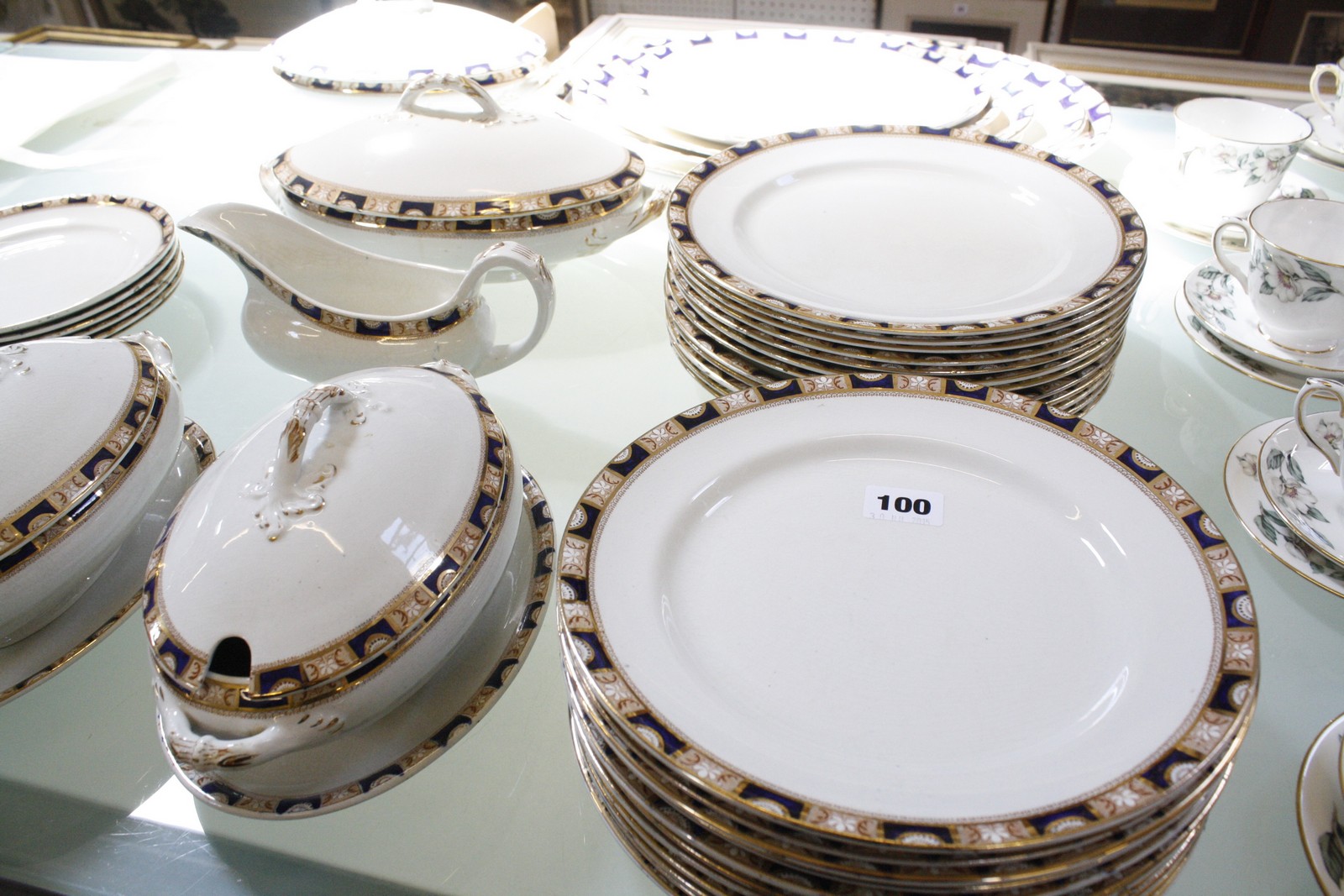 A Pountney and Co. Bristol 'Cromer' pattern part dinner service, a Royal Albert part tea service,