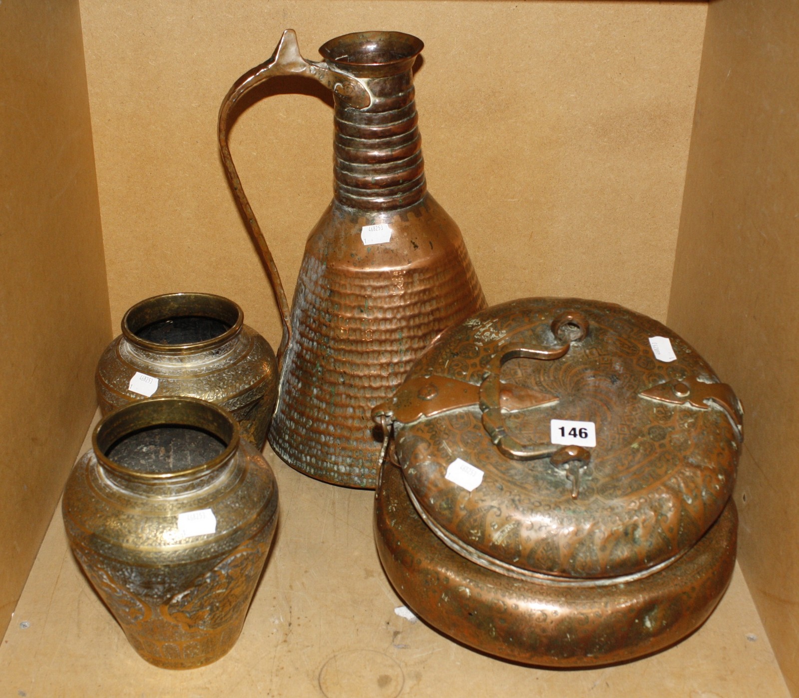 A Persian/Islamic copper ewer, a pot with hinged cover and two modern Indian vases (4)