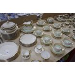 A Tuscan china part tea service, a Paragon part tea service, a Cauldron china part dinner service, a