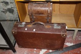A doctor's Gladstone brown leather bag, with stereoscope, a vintage brown leather bowls bag