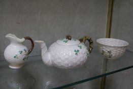 A Belleek shamrock tea service, second period, to include teapot, jug, sugar basin, two cups, two