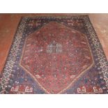 A Persian Qashqai carpet 314 x 221cm