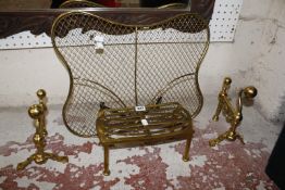 A brass mesh firescreen and a George II style walnut wall mirror, brass trivet and pair of andirons