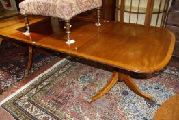 A mahogany twin pedestal extending dining table in George III style, 20th Century 247cm extended