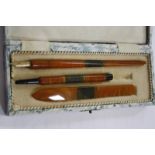 A Bakelite writing set, the fountain dip pen with 14ct gold plated nib, a propelling pencil, all