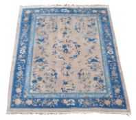 A Chinese carpet, approximately 353 x 272cm Best Bid