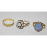 A 22ct gold ring, decorated with hearts, 3.3g approx. a 9ct gold and opal nine stone floral