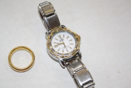 A 22ct gold wedding band, 10.6g approx. and a Lorus sports watch (2)