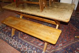 A pine trestle table on X-frame support 73cm high, 183cm, together with a pine bench
Purchased from