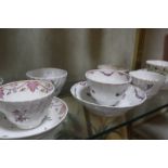 Twelve assorted tea bowls, to include a Worcester blue and white 'Mansfield' pattern tea bowl with