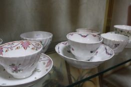 Twelve assorted tea bowls, to include a Worcester blue and white 'Mansfield' pattern tea bowl with