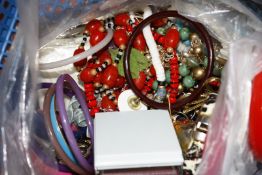 A quantity of costume jewellery, a ring marked 14K, pearl necklaces, earrings brooches, beaded