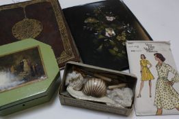 A Victorian papier mache album cover containing blank paper and some loose envelopes, writing set