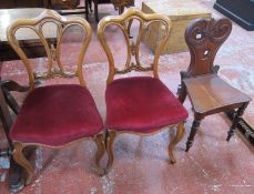 A shield back hall chair; and two Victorian side chairs