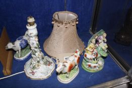 A Staffordshire group of musicians with farm animals, 19cm high  and a Dresden porcelain table lamp,
