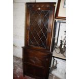 A carved oak floor standing corner cupboard 183cm high, 69cm wide  Best Bid