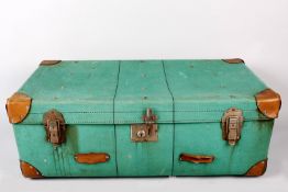 A green canvas covered luggage case and a 19thc oak silver chest