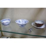 A Nanking Cargo tea bowl and saucer, a pair of blue and white tea bowls, another Chinese blue and