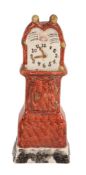 A Staffordshire pearlware model of a longcase clock, first quarter 19th century  A Staffordshire