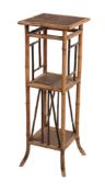 A Victorian bamboo stand, circa 1870, with three caned tiers joined by...   A Victorian bamboo