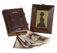 A leather and brass-bound photograph or carte de visite album  A leather and brass-bound