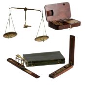 Four various boxed sets of portable sovereign scales, 19th century  Four various boxed sets of