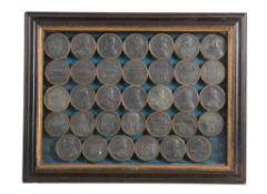 A George III cased set of thirty-four commemorative medallions  A George III cased set of thirty-