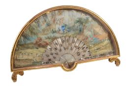 A painted and parcel gilt paper and decorated mother-of-pearl fan  A painted and parcel gilt paper