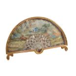 A painted and parcel gilt paper and decorated mother-of-pearl fan  A painted and parcel gilt paper