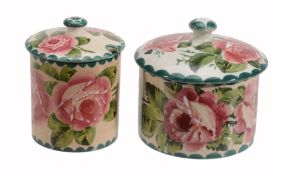 A Wemyss biscuit jar and cover, circa 1900 , painted with pink roses  A Wemyss biscuit jar and