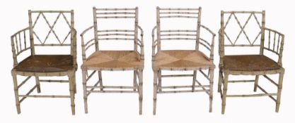 A pair of simulated bamboo armchairs in Regency style  A pair of simulated bamboo armchairs in