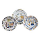 Three Dutch Delft polychrome chinoiserie chargers , second half 18th century  Three Dutch Delft