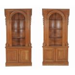 A pair of pine dome backed recess cabinets in George III style, 20th century  A pair of pine dome