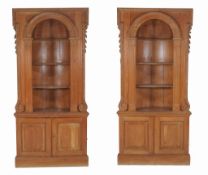 A pair of pine dome backed recess cabinets in George III style, 20th century  A pair of pine dome