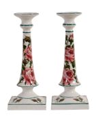 A pair of Wemyss tall candlesticks, circa 1900  A pair of Wemyss tall candlesticks, circa 1900,