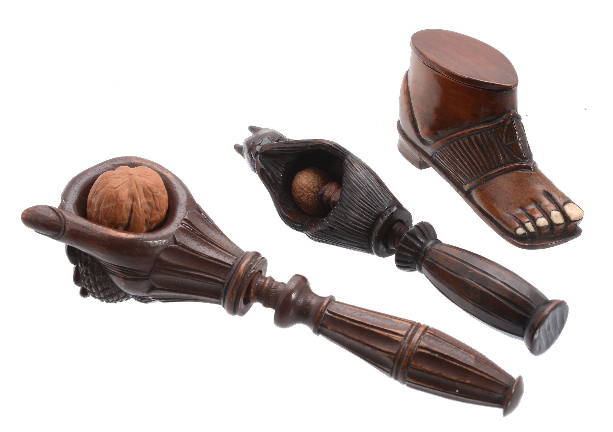 A mahogany and bone snuff box, circa 1870, carved as an open toed sandal  A mahogany and bone