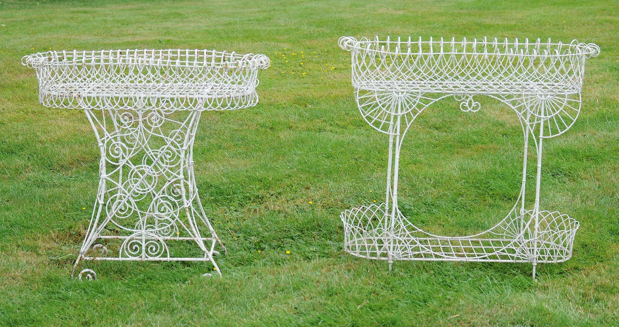 Two similar wirework planters, 20th century  Two similar wirework planters,   20th century, each