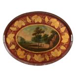 A French red and parcel gilt tole peinte oval tray, circa 1820  A French red and parcel gilt  tole