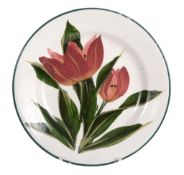 A small Wemyss plate, circa 1900, painted by Karl Nekola, with red tulips  A small Wemyss plate,