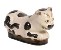 A Chinese Chizou style model of a recumbant cat, late Qing  A Chinese Chizou style model of a
