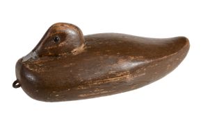 A Victorian carved and painted pine decoy duck, circa 1890  A Victorian carved and painted pine
