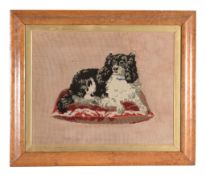 A framed and glazed tapestry picture of Queen Victoria  A framed and glazed tapestry picture of
